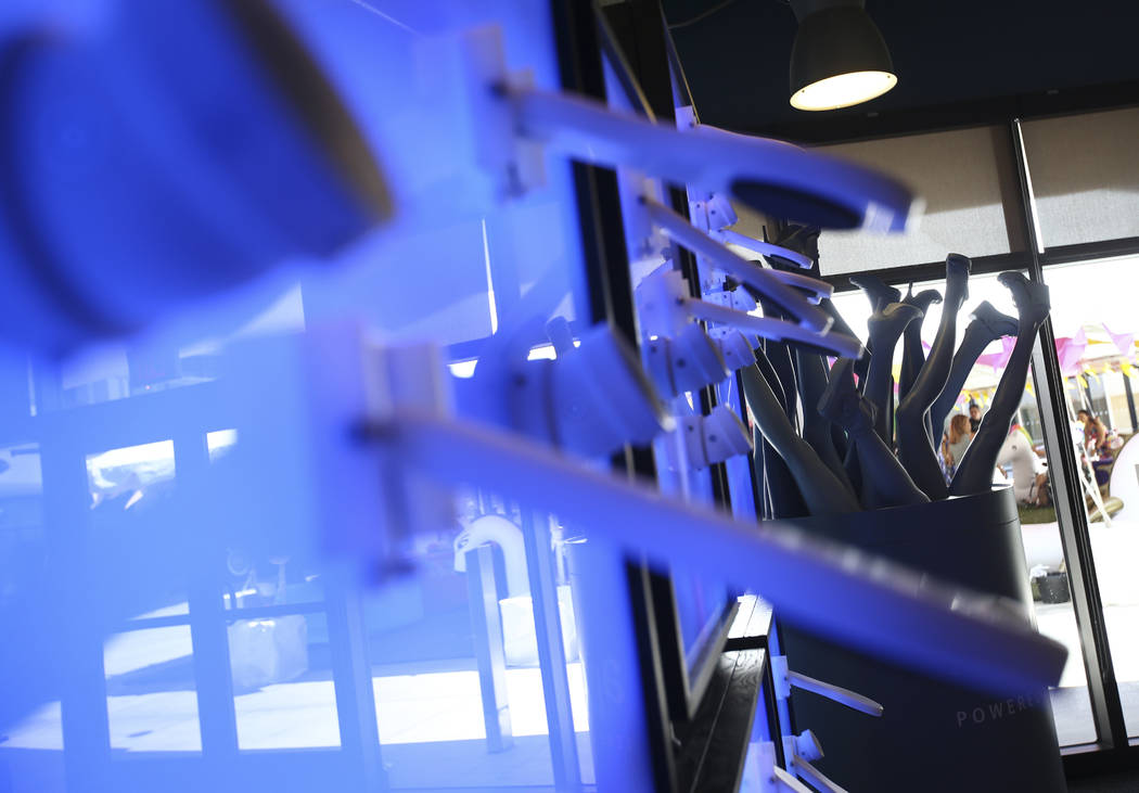 The entrance to the lobby area at Zappos is reflected in an installation at the company's headquarters in Las Vegas on Thursday, June 1, 2017. Chase Stevens Las Vegas Review-Journal @csstevensphoto