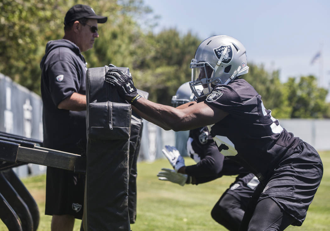 Raider linebackers hit the sleds during rookie minicamp on Friday, May 5, 2017, at Oakland Raiders Headquarters, in Alameda, Calif. Benjamin Hager Las Vegas Review-Journal @benjaminhphoto