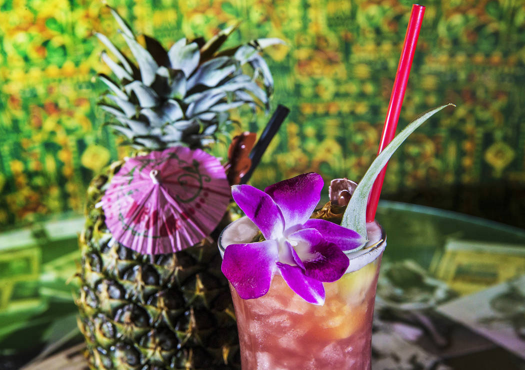 The kuuipo, with J. Wray golden rum, Lejay crème de cassis, pineapple juice, pineapple gomme syrup and lime juice in pineapple at The Golden Tiki on Saturday, May 27, 2017, in Las Vegas. Benjamin ...