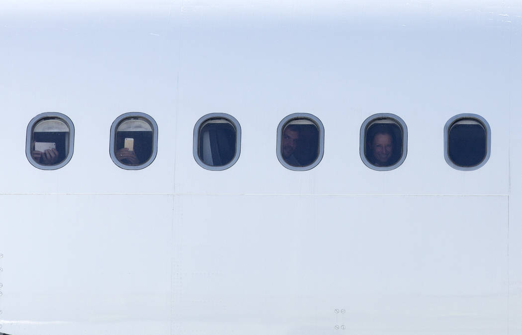 Passengers on the first Eurowings flight, that few direct from Cologne, Germany, look out their windows at McCarran International Airport on Friday, June 2, 2017 in Las Vegas.  Bridget Bennett Las ...