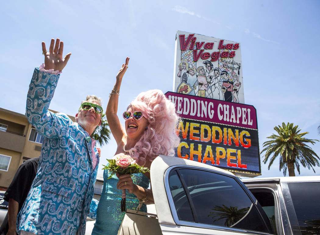 Andrea Cambridge and Chuck Varga wave goodbye to wedding guests after their Liberace-themed wedding at the Viva Las Vegas Wedding Chapel on Saturday, June 3, 2017.  Patrick Connolly Las Vegas Revi ...