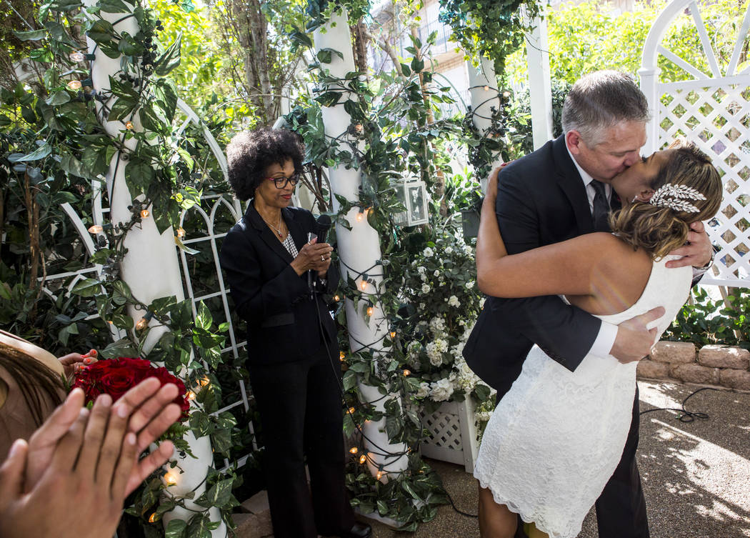 Wayne Ingram, Jr., and Claudia Escobar kiss during their wedding at the Viva Las Vegas Wedding Chapel on Saturday, June 3, 2017.  Patrick Connolly Las Vegas Review-Journal @PConnPie