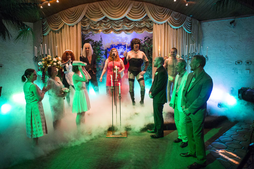 The song &quot;There's A Light (Over At The Frankenstein Place)&quot; plays during the Rocky Horror Picture Show wedding of Alex Spivak and Dominique Lehn at the Viva Las Vegas Wedding Cha ...