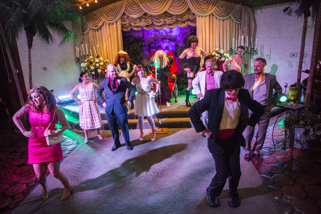 Wedding guests and actors dance to &quot;The Time Warp&quot; during the Rocky Horror Picture Show wedding of Alex Spivak and Dominique Lehn at the Viva Las Vegas Wedding Chapel on Saturday ...