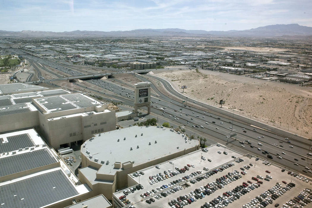 The proposed site for the Raiders football stadium, right, near Interstate 15 and Russell Road, in Las Vegas on Wednesday, June 7, 2017. Mandalay Bay is to the left of the site. (Erik Verduzco/Las ...
