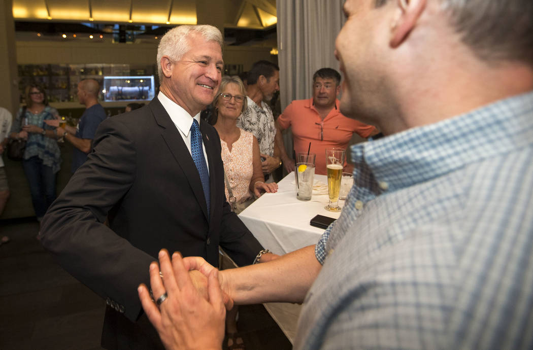 Las Vegas city council candidate Col. Steve Seroka is greeted by guest attending his election result party at Andiron Steak and Sea in Las Vegas on Tuesday, June 13, 2017. Richard Brian Las Vegas  ...