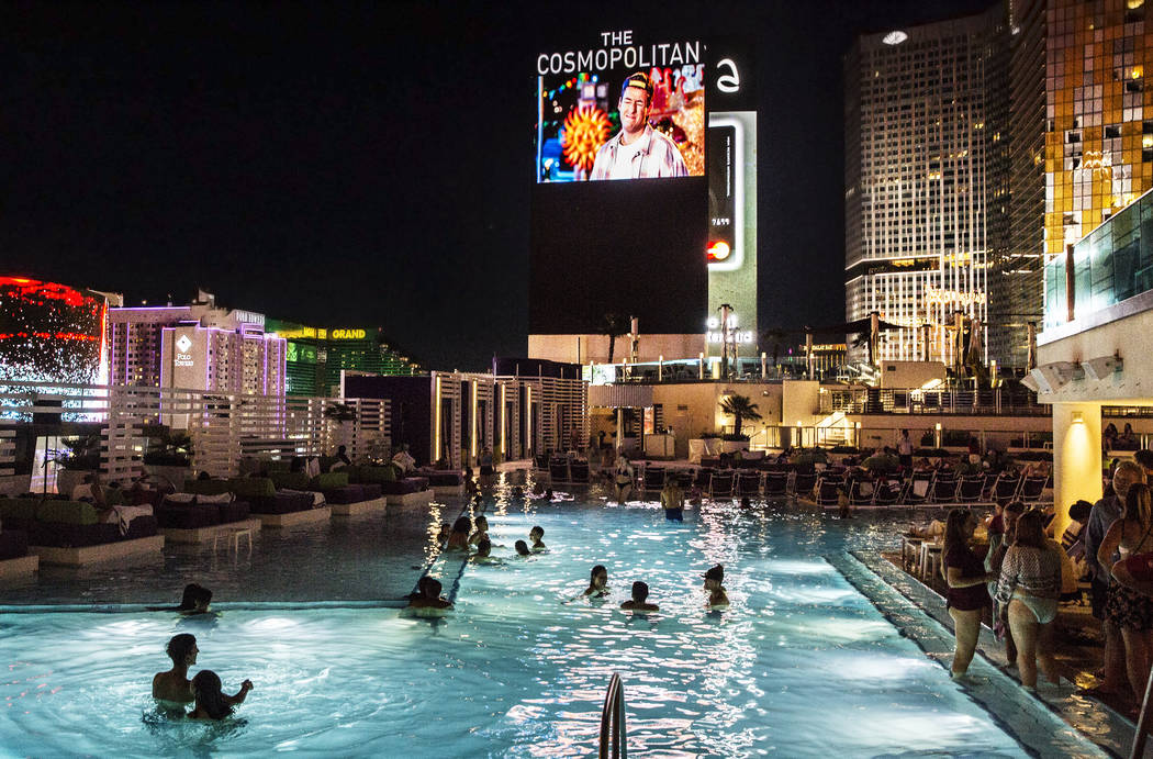 Poolgoers Enjoy A Showing Of Happy Gilmore During Dive In Movies At Boulevard Pool At The Cosmopolitan Las Vegas On Monday June 5 17 Benjamin Hager Las Vegas Review Journal Benjaminhphoto Las Poolgoers Enjoy A Showing Of Happy Gilmore During Dive In Movies At Boulevard Pool At The Cosmopolitan Las Vegas On Monday June 5 17 Benjamin Hager Las Vegas Review Journal Benjaminhphoto Las