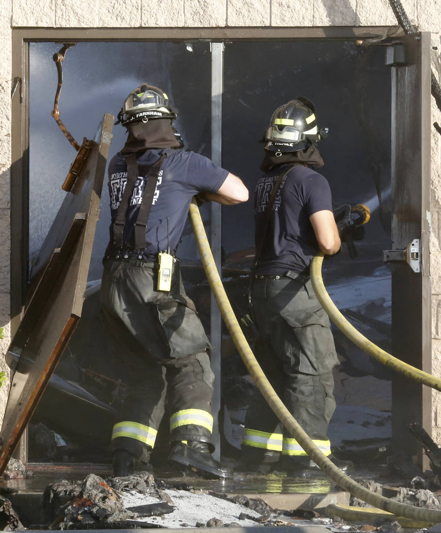 North Las Vegas firefighters spray water on Zion United Methodist Church, 2108 Revere St., which was reported on fire about 1 a.m. Tuesday, June 6, 2017. (Bizuayehu Tesfaye/Las Vegas Review-Journa ...