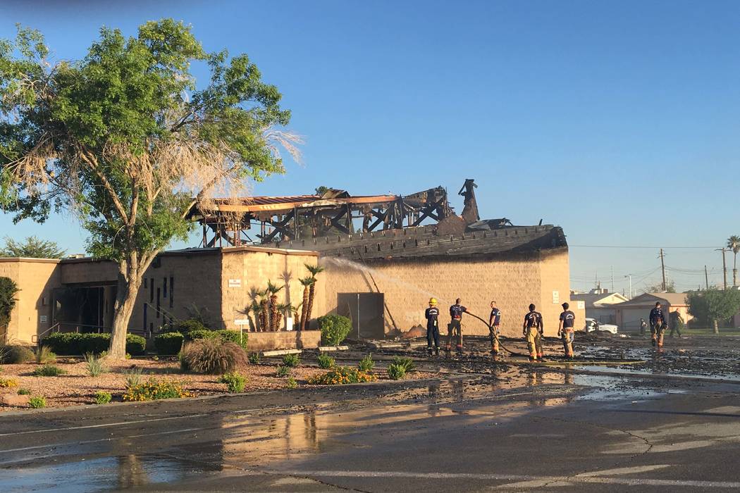 North Las Vegas firefighters spray water on Zion United Methodist Church, 2108 Revere St., which was reported on fire about 1 a.m. Tuesday, June 6, 2017. (Bizuayehu Tesfaye/Las Vegas Review-Journa ...