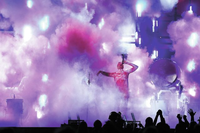 Dan Reynolds of Imagine Dragons performs at the 56th annual Grammy Awards at Staples Center on Sunday, Jan. 26, 2014, in Los Angeles. (Photo by Matt Sayles/Invision/AP)