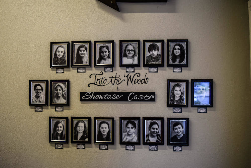 Each cast of the company's latest large-scale production is displayed on the hallway leading to the theatre so other students can feel inspired. (Alex Meyer/View) @alxmey