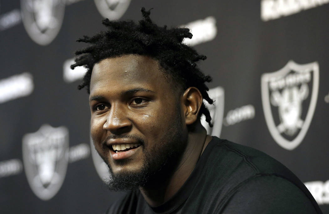 Oakland Raiders defensive end Mario Edwards Jr. speaks to reporters during a rookie minicamp at an NFL football facility in Alameda, Calif., Friday, May 8, 2015. (AP Photo/Jeff Chiu)