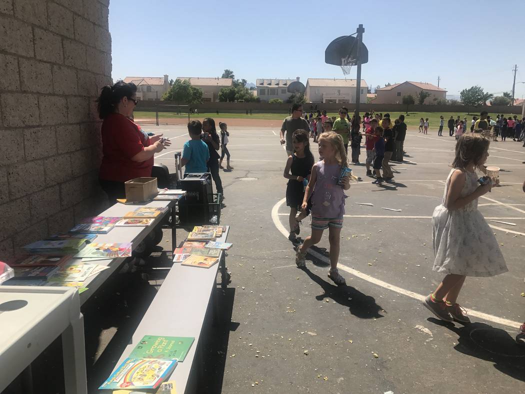 Elizabeth Wilhelm Elementary School students participate in book walk during a school event to celebrate being the school with the most hours of reading with the Clark County School District's App ...
