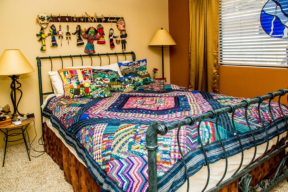 The couple managed to visit all seven continents and brought back lots of folk art, particularly from Mexico and Peru, which are displayed in one of the guest bedrooms. (Tonya Harvey Real Estate M ...