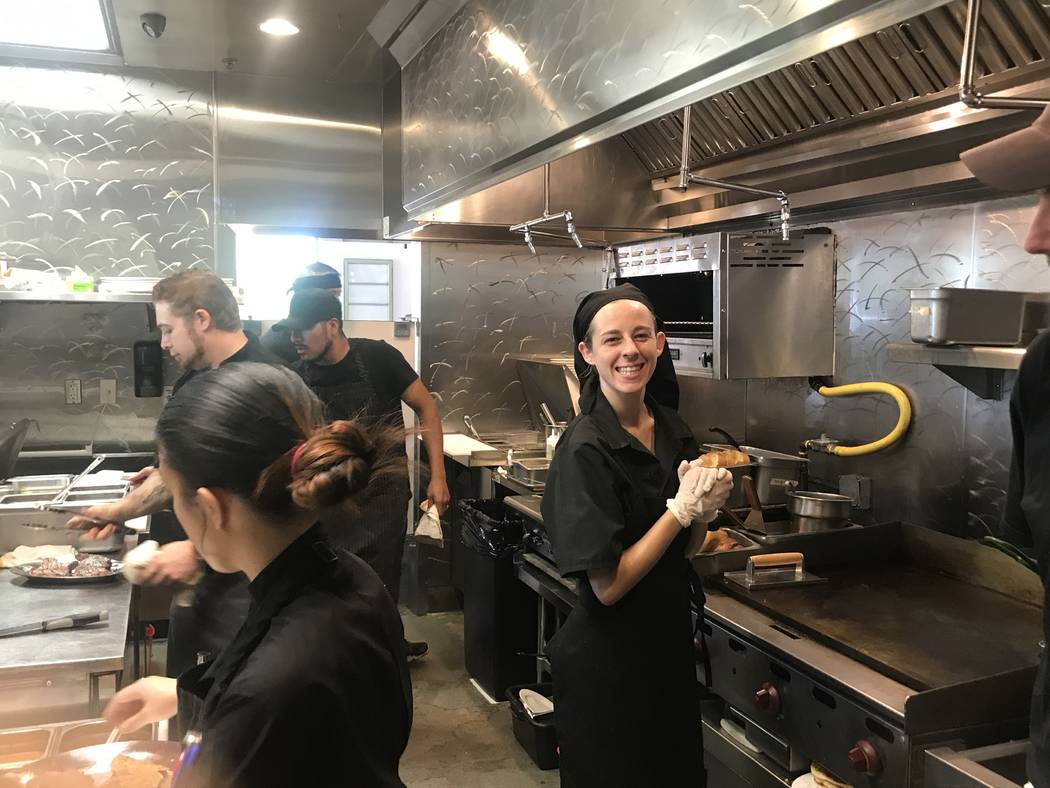 The kitchen staff prepares for opening day at Eat Summerlin. (Al Mancini)