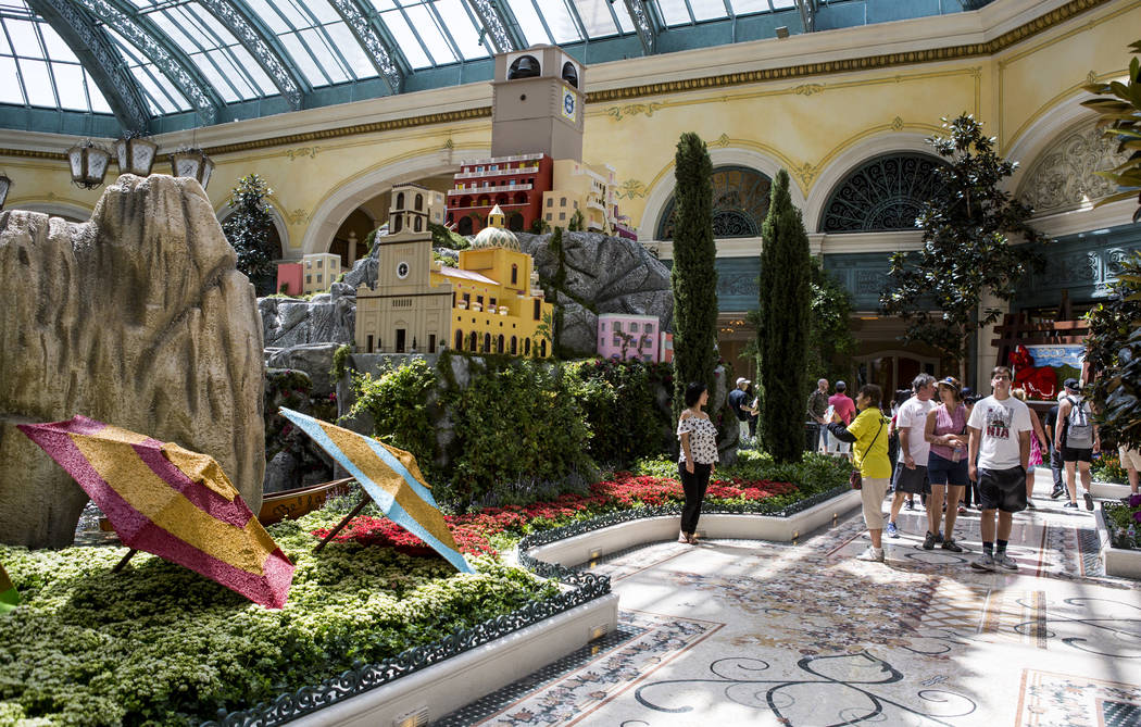 Guests visit the new Italian-inspired display at Bellagio's Conservatory & Botanical Gardens on Monday, June 12, 2017.  Patrick Connolly Las Vegas Review-Journal @PConnPie