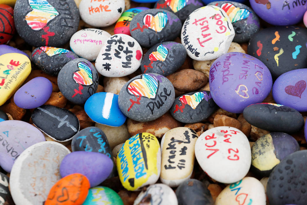 Stones with messages for the victims and survivors are piled outside the Pulse Nightclub on the one-year anniversary of the shooting, in Orlando, Florida. (Scott Audette/Reuters)