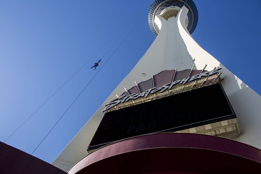 A thrill seeker falls to the earth while riding SkyJump at the Stratosphere on Monday, June 12, 2017. Golden Entertainment, operators of the PT's Pubs chain is acquiring a company that owns four N ...
