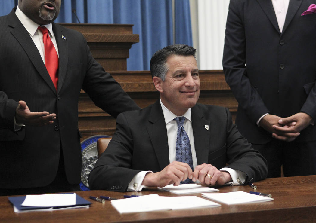 Gov. Brian Sandoval before signing a group of bills while at the Nevada State Capitol Building in Carson City on Monday, June 5, 2017. (Chase Stevens Las Vegas Review-Journal) @csstevensphoto