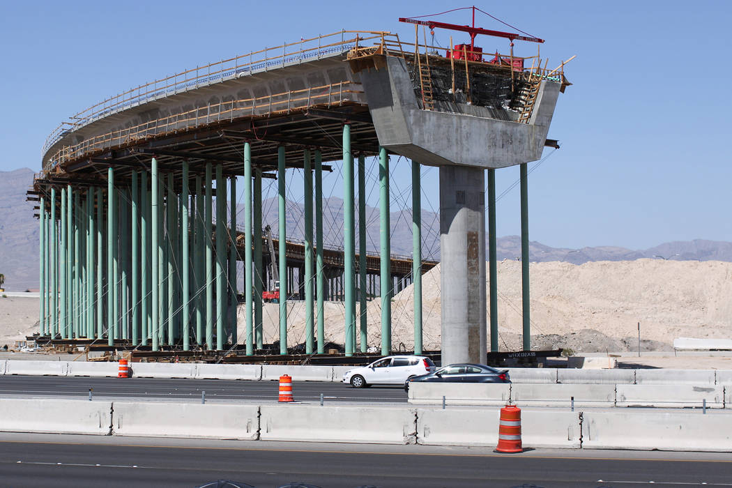 Cars on U.S. 95 pass by an overpass being built in the Centennial bowl in Las Vegas on Monday, July 11, 2016. Brett Le Blanc/Las Vegas Review-Journal Follow @bleblancphoto