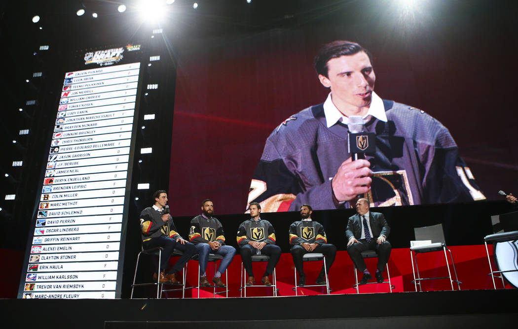 Vegas Golden Knights' Marc-Andre Fleury, left, speaks alongside fellow players Deryk Engelland, Brayden McNabb, and Jason Garrison during a roundtable following the NHL Awards and expansion draft  ...
