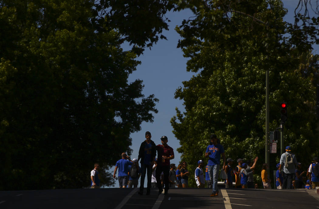 Fans arrive for the Golden State Warrior's victory parade and rally in downtown Oakland, Calif. on Thursday, June 15, 2017. Chase Stevens Las Vegas Review-Journal @csstevensphoto