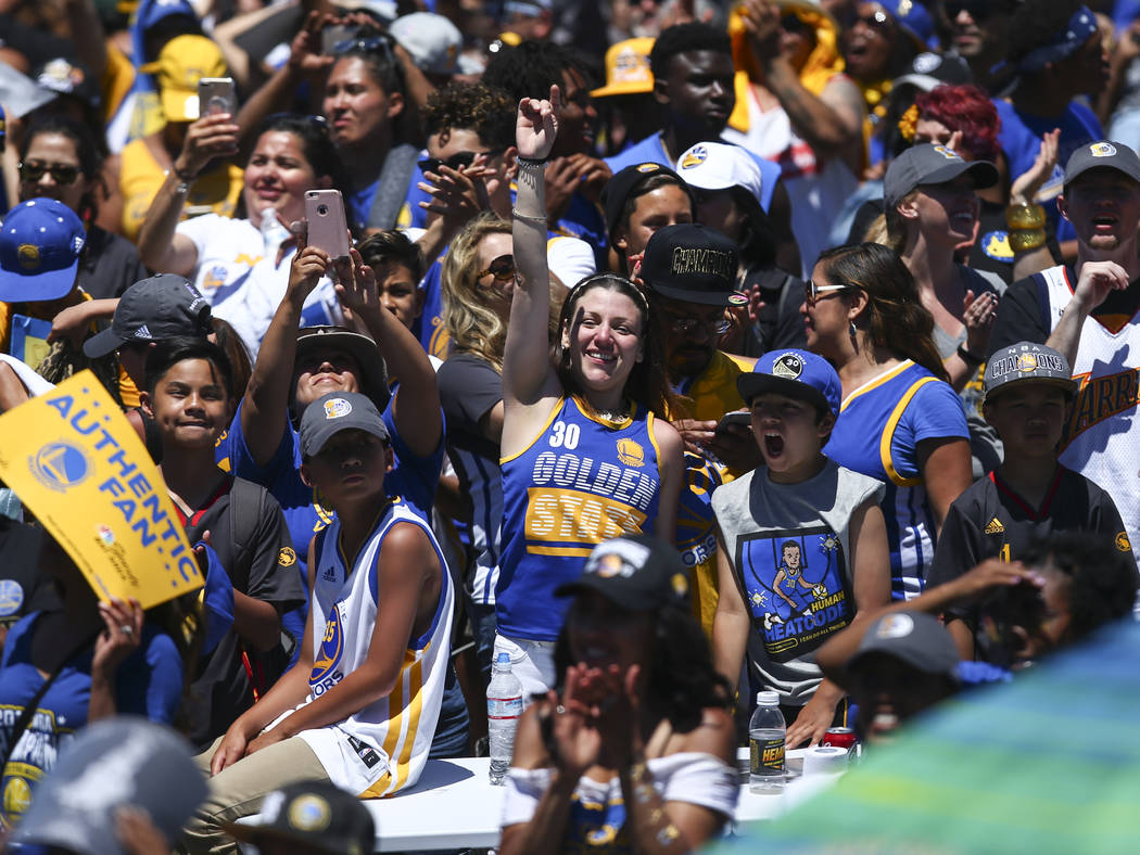 Fans during the Golden State Warrior's victory parade and rally in downtown Oakland, Calif. on Thursday, June 15, 2017. Chase Stevens Las Vegas Review-Journal @csstevensphoto