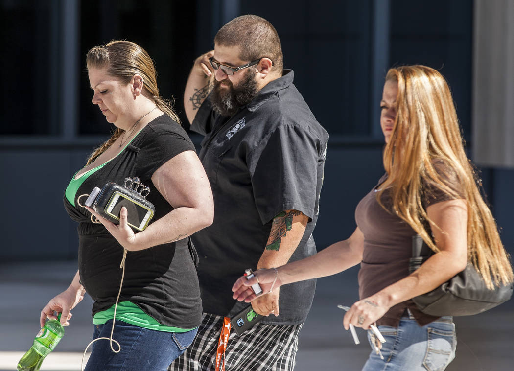 Supporters of arrested Vagos Outlaw Motorcycle Gang members walk out of the Lloyd George U.S. Courthouse in downtown Las Vegas on Friday, June 16, 2017.  Patrick Connolly Las Vegas Review-Journal  ...