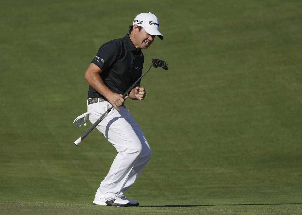 Brian Harman reacts after missing a birdie putt on the 12th during the fourth round of the U.S. Open golf tournament Sunday, June 18, 2017, at Erin Hills in Erin, Wis. (AP Photo/Chris Carlson)