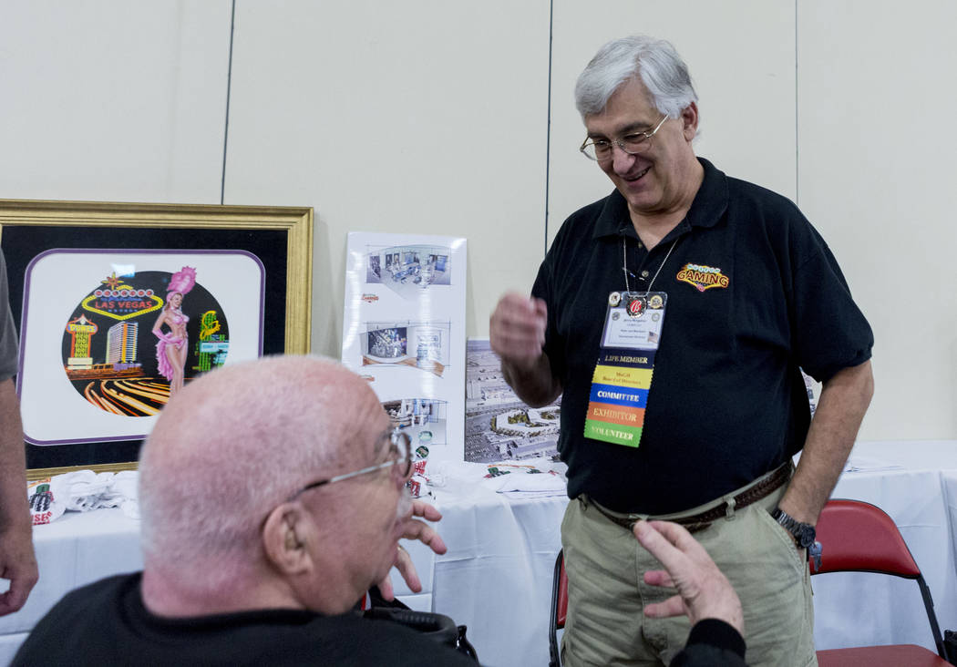 Sheldon Smith convention co-chairperson, left, and Jerry Vergatos, future convention president  talk during the 25th annual Casino Collectibles Convention at South Point hotel-casino  in Las Vegas ...