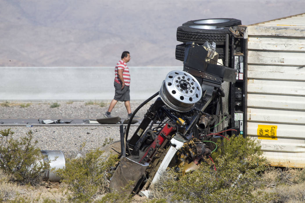 Two semitrailers were damaged in a crash that injured one woman on northbound Interstate 15 near Primm, Wednesday morning, June 21 2107. Northbound lanes are shut down. (Richard Brian/Las Vegas Re ...