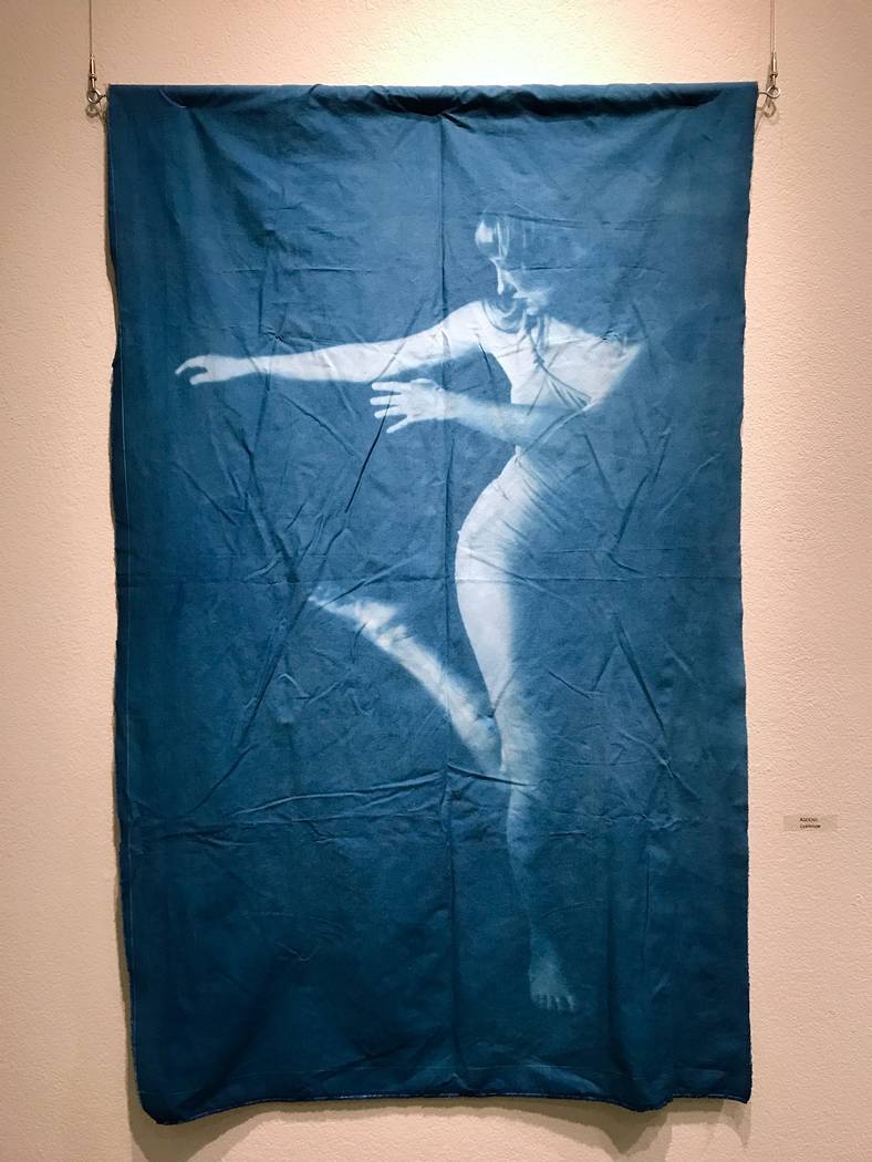 "Ascend" by Melissa Gaudet hangs at the West Charleston Library. (Madelyn Reese/View) @MadelynGReese