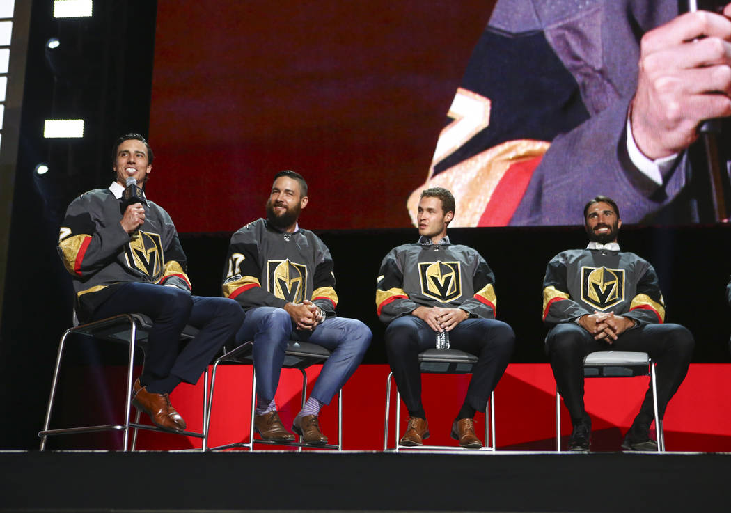 Vegas Golden Knights' Marc-Andre Fleury, left, speaks alongside fellow players Deryk Engelland, Brayden McNabb, and Jason Garrison during a roundtable following the NHL Awards and expansion draft  ...