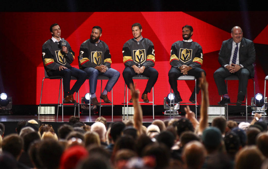 Vegas Golden Knights' Marc-Andre Fleury, left, speaks alongside fellow players Deryk Engelland, Brayden McNabb, and Jason Garrison during a roundtable following the NHL Awards and expansion draft  ...