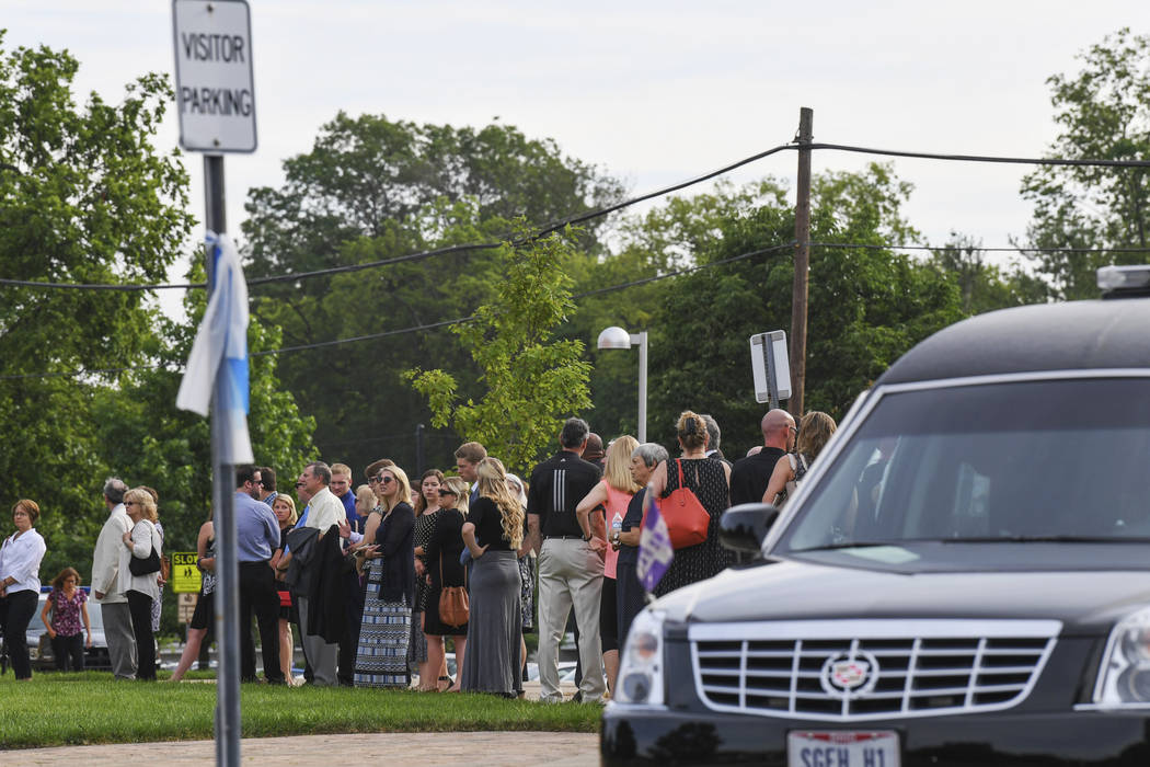 Mourners line up as they arrive for the funeral of Otto Warmbier, Thursday, June 22, 2017, in Wyoming, Ohio. Warmbier, a 22-year-old University of Virginia undergraduate student who was sentenced  ...