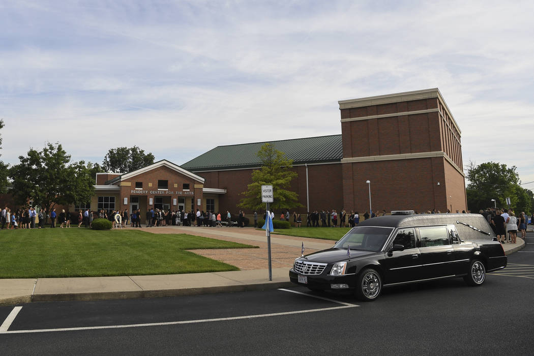 Mourners arrive for the funeral of Otto Warmbier, Thursday, June 22, 2017, in Wyoming, Ohio. Warmbier, a 22-year-old University of Virginia undergraduate student who was sentenced in March 2016 to ...