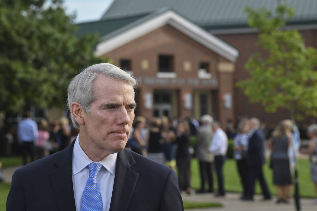 Sen. Rob Portman, R-Ohio, speaks to the press before the funeral of Otto Warmbier, Thursday, June 22, 2017, in Wyoming, Ohio. Warmbier, a 22-year-old University of Virginia undergraduate student w ...