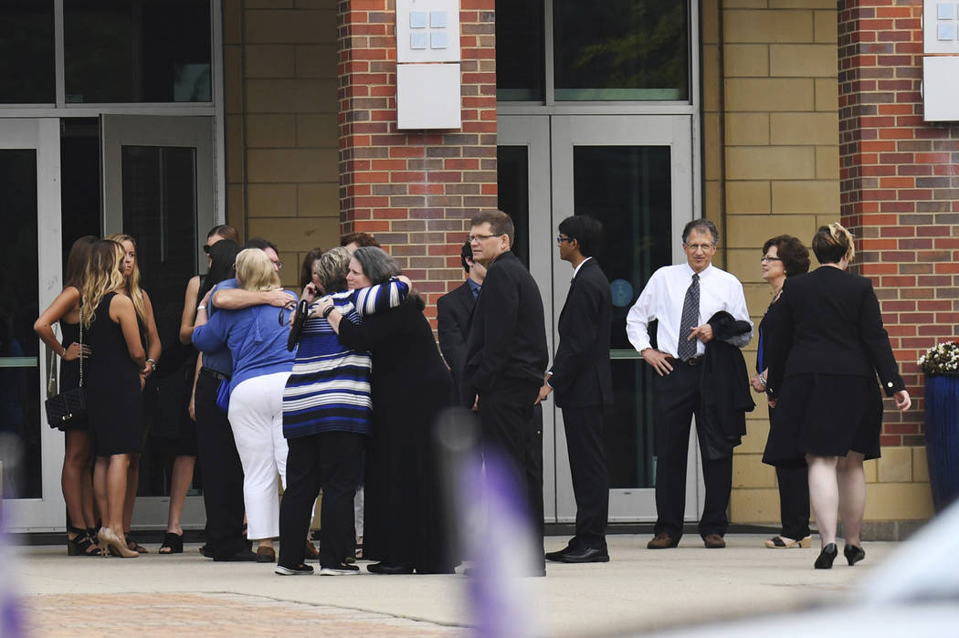 Mourners arrive for the funeral of Otto Warmbier, Thursday, June 22, 2017, in Wyoming, Ohio. Warmbier, a 22-year-old University of Virginia student who was sentenced in March 2016 to 15 years in p ...