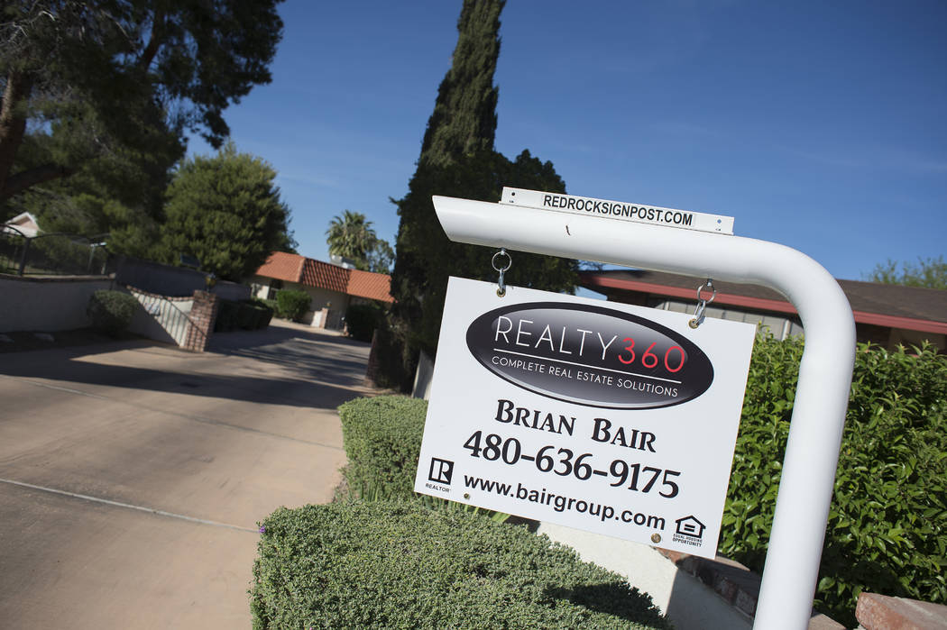 A "for sale" sign in front a home near the intersection of  West Washington Avenue and North Valley View Boulevard on Wednesday, May 3, 2017, in Las Vegas. (Bridget Bennett/Las Vegas Review-Journa ...