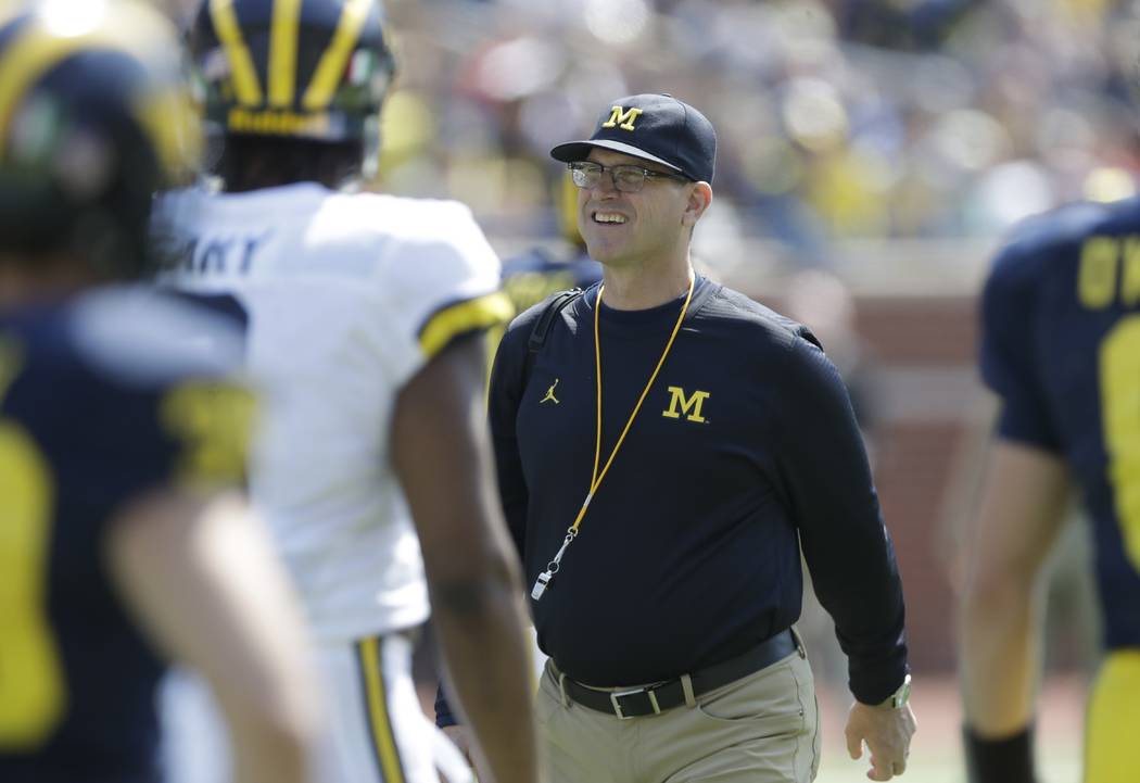 Michigan head coach Jim Harbaugh is seen during the Michigan spring football game, Saturday, April 15, 2017, in Ann Arbor, Mich. (AP Photo/Carlos Osorio)