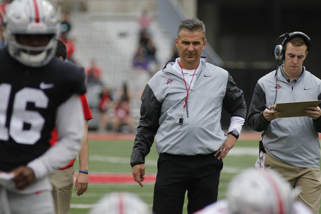 Ohio State head coach Urban Meyer watches their NCAA college spring football game Saturday, April 15, 2017, in Columbus, Ohio. (AP Photo/Jay LaPrete)