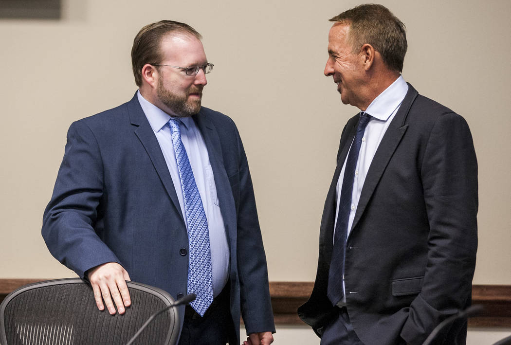 Thom Reilly, the newly appointed chancellor of the Nevada System of Higher Education, right, talks with Regent Patrick R. Carter after a Board of Regents meeting in the NSHE office in Las Vegas on ...