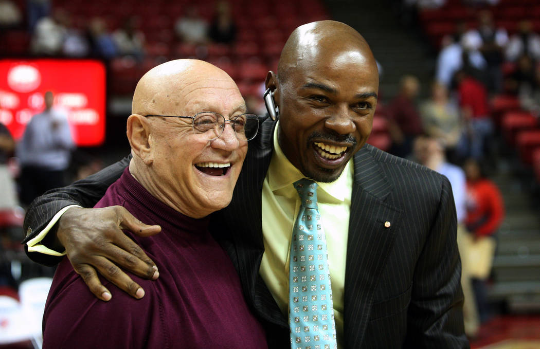 Former Las Vegas basketball coach Jerry Tarkanian, left, greets former player Greg Anthony, right, after the UNLV Alumni game on Tuesday Nov. 7, 2006, at the Thomas & Mack Center in Las Vegas. ...