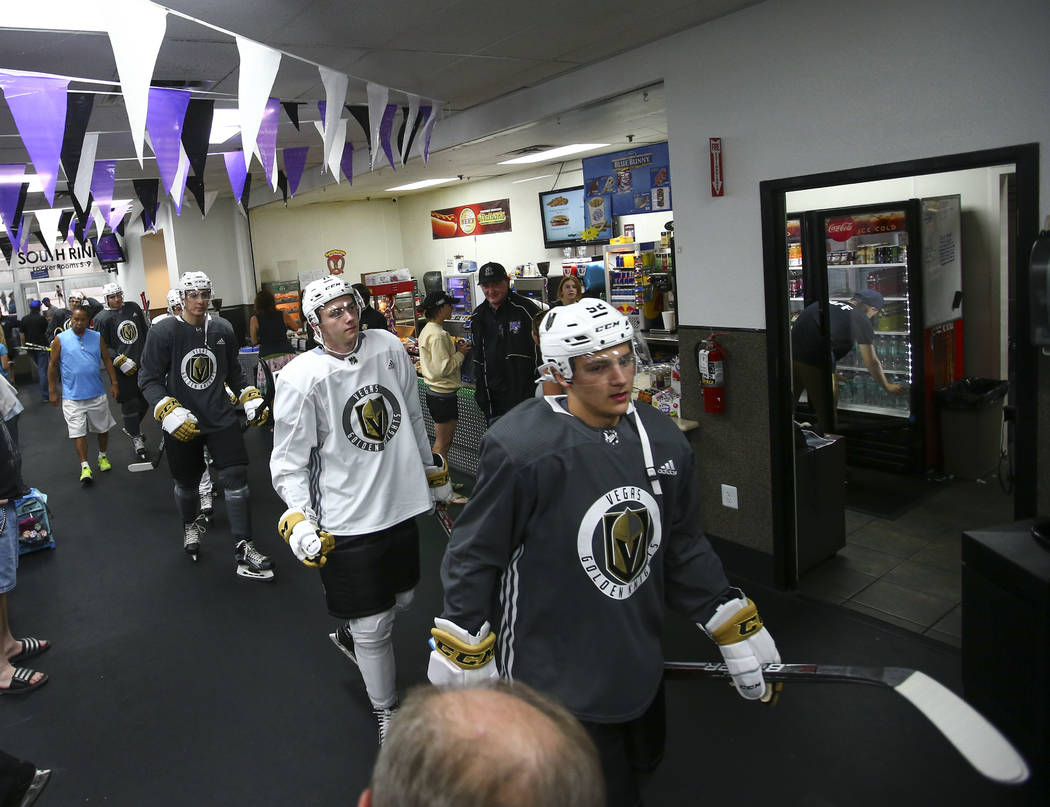 Vegas Golden Knights' Erik Brannstrom, right, heads to the ice rink with teammates during the team's development camp at Las Vegas Ice Center on Tuesday, June 27, 2017. Chase Stevens Las Vegas Rev ...