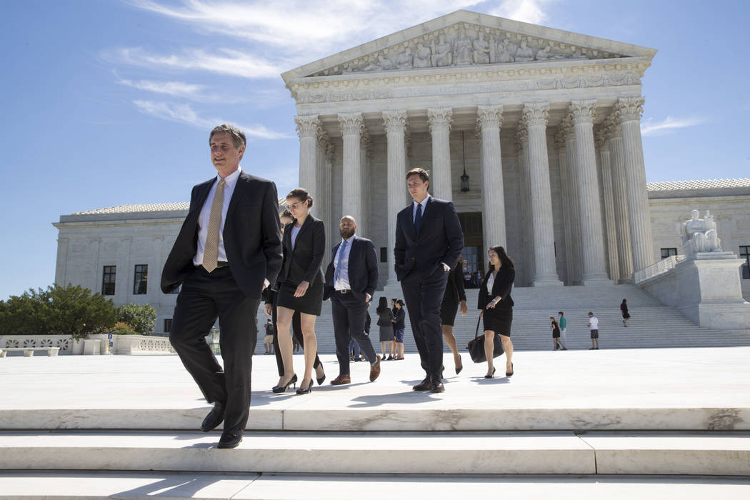 People leave the Supreme Court in Washington, Monday, June 26, 2017, as justices issued their final rulings for the term. (J. Scott Applewhite/AP)
