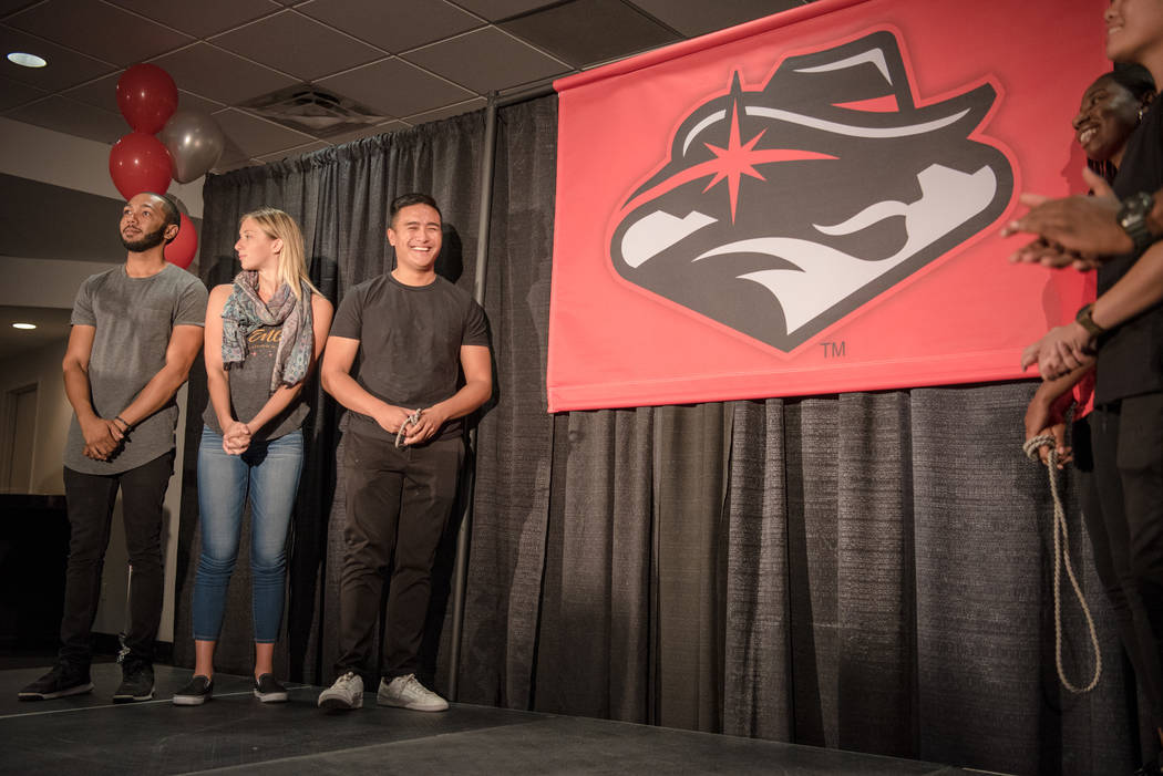 UNLV students that participated in the graphic design process of the new logo stand on stage during the unveiling at the UNLV Thomas & Mack Center on Wednesday, June 28, 2017, in Las Vegas. Mo ...