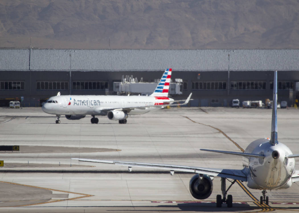 Planes taxi the runway at McCarran International Airport in Las Vegas on Wednesday, June 28, 2017. Richard Brian Las Vegas Review-Journal @vegasphotograph