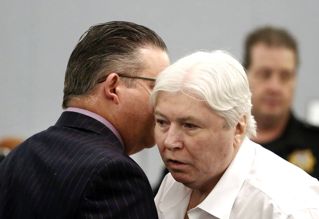 Thomas Randolph, right, who is accused of hiring a hitman to kill his last wife and killed the hitman, listens to his attorney, Clark Patrick, before being found guilty on two counts of murder and ...