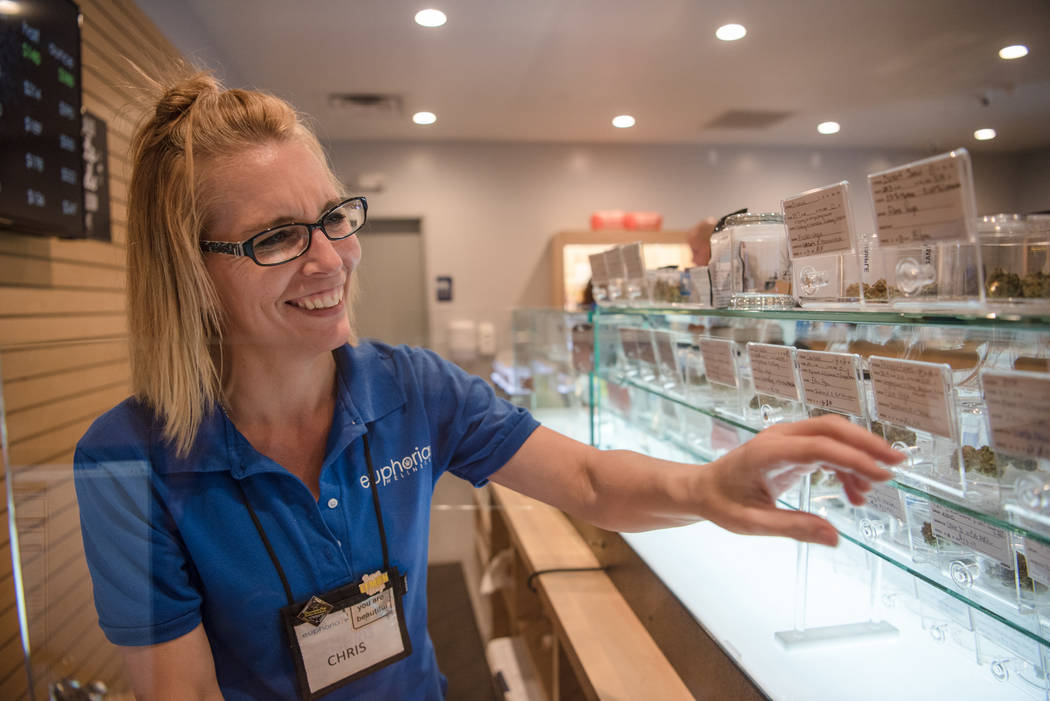 Employee Christine Parman checks out the numerous products on display at Euphoria Wellness on Thursday, June 29, 2017, in Las Vegas. Morgan Lieberman Las Vegas Review-Journal