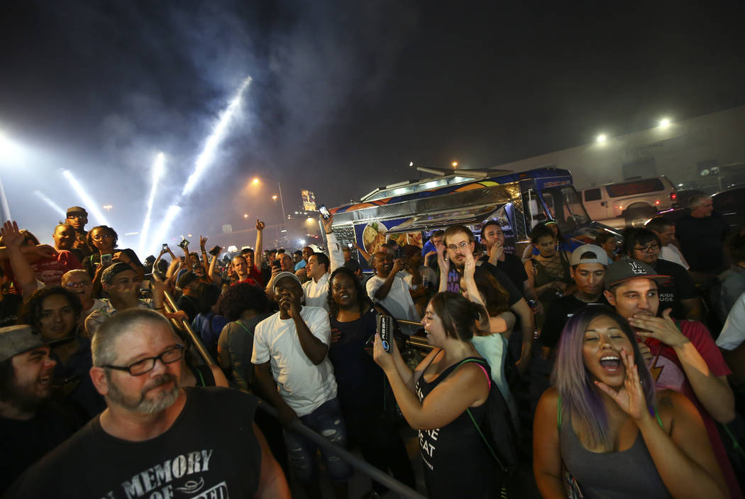 Customers cheer as the clock turns to midnight allowing  for the purchase of recreational marijuana at Reef Dispensaries in Las Vegas on Saturday, July 1, 2017. Chase Stevens Las Vegas Review-Jour ...